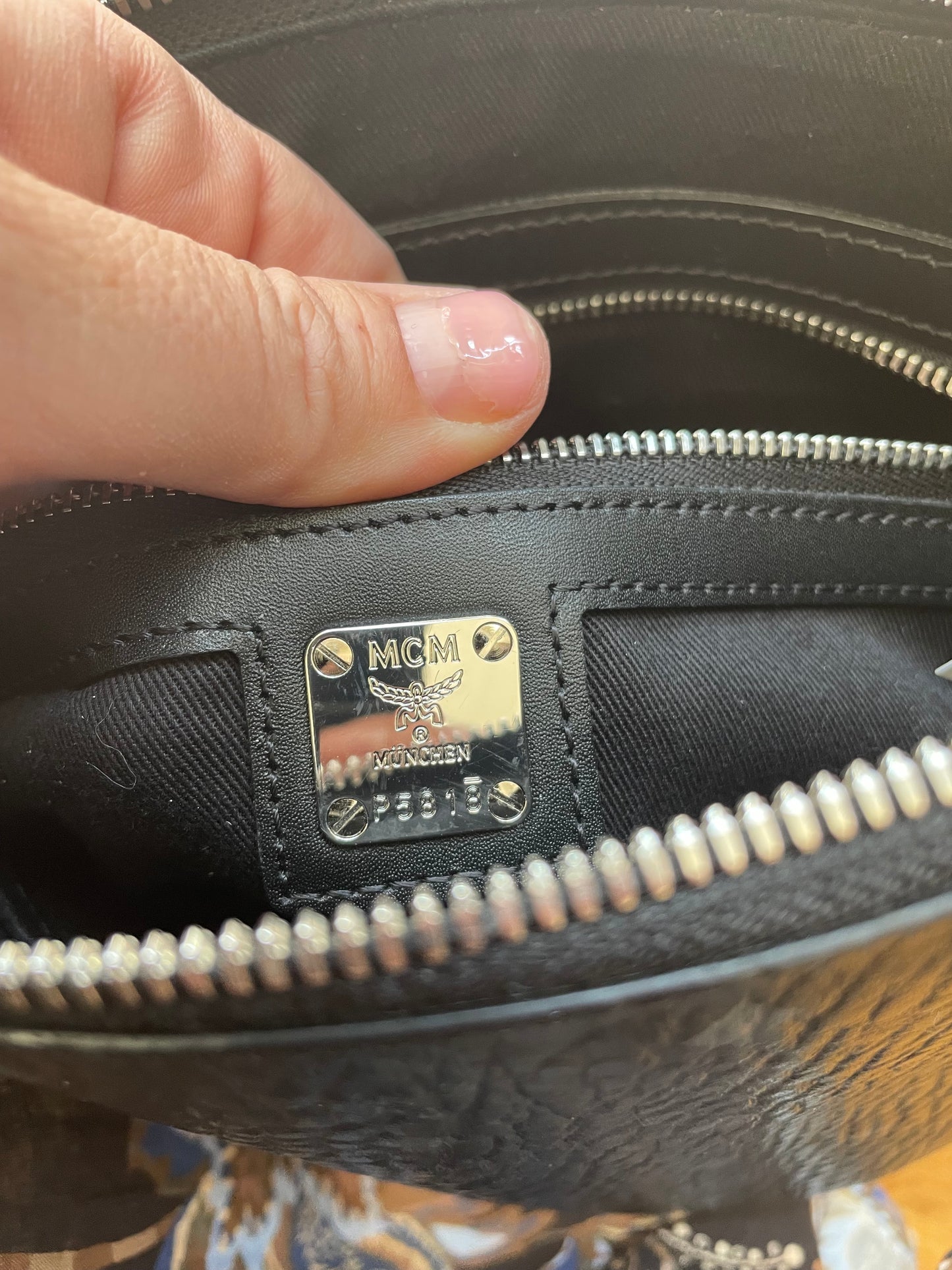 Black, Logo  MCM Handbag  "Aren" bag or Clutch MSRP $550